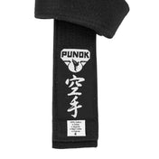 Black belt label panel with PUNOK logo, kanji text, and cotton content tag