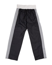 Tenacity pant by WAKO C-Gear, black with white side stripes and textured leg pattern