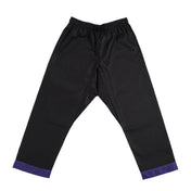 Black martial arts gi pants with purple hem trim and elastic waistband