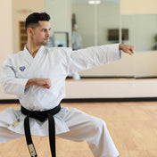 Punok kata uniform gi with white jacket, black belt, and logo patch