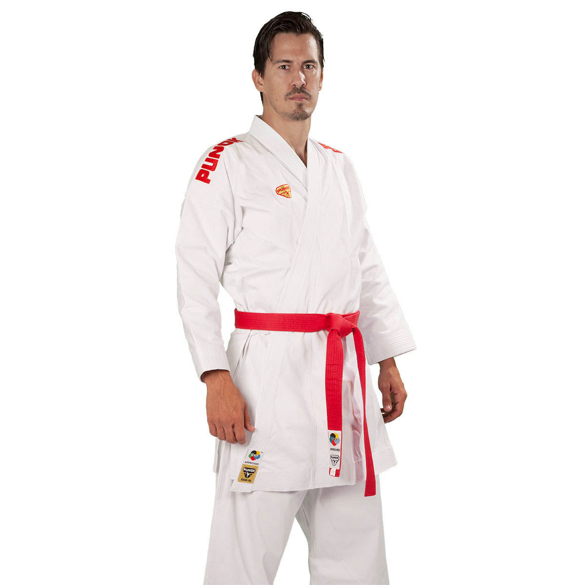 White karate gi with red belt and matching pants