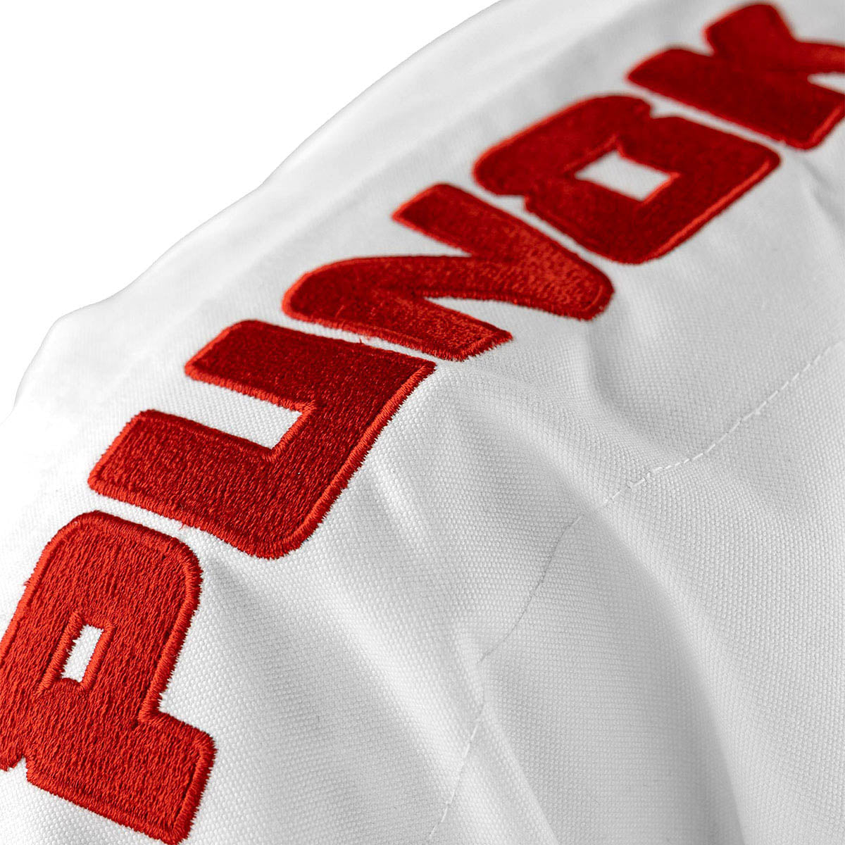 White gi jacket with red Punok logo embroidery on chest