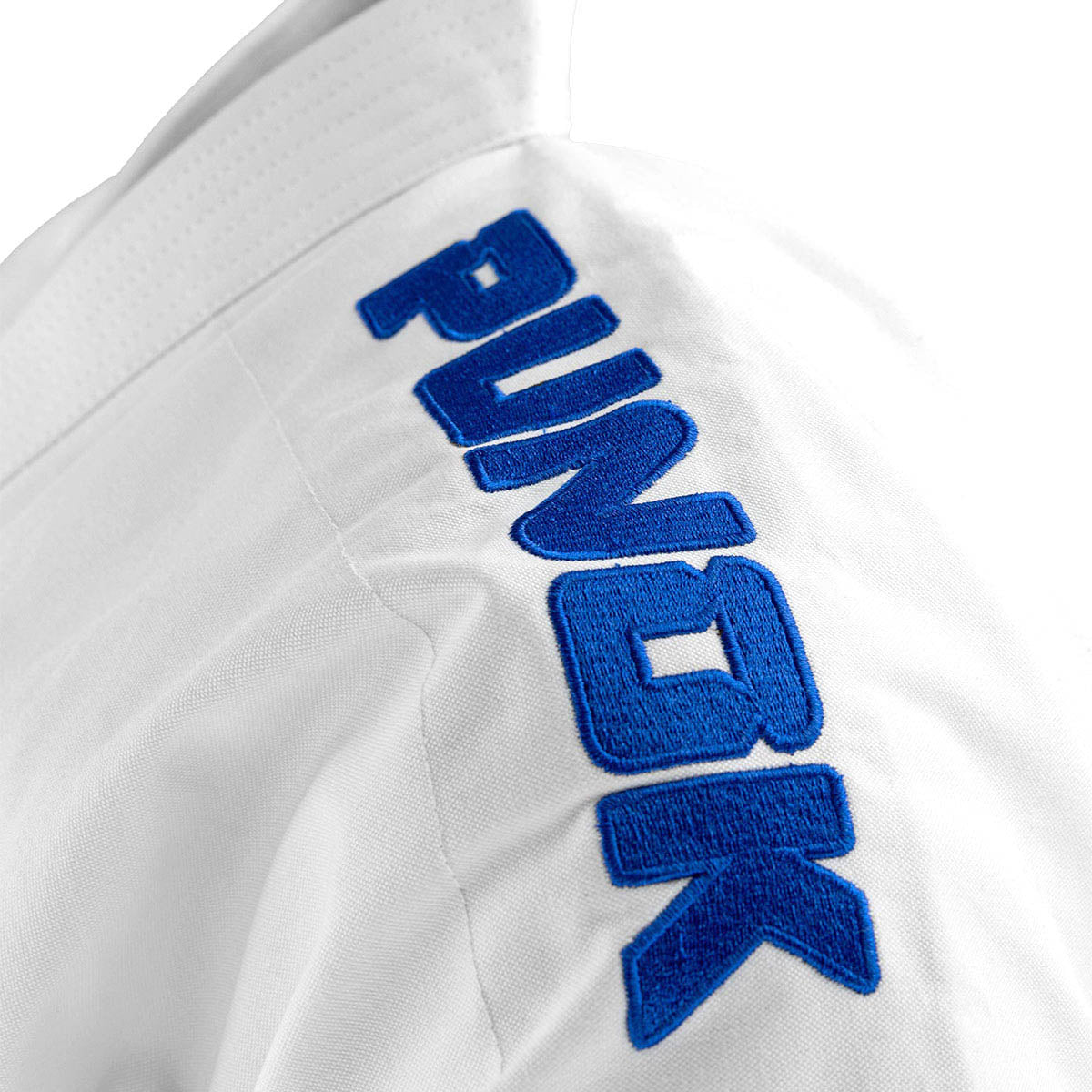 White gi jacket with blue vertical Punok logo embroidery