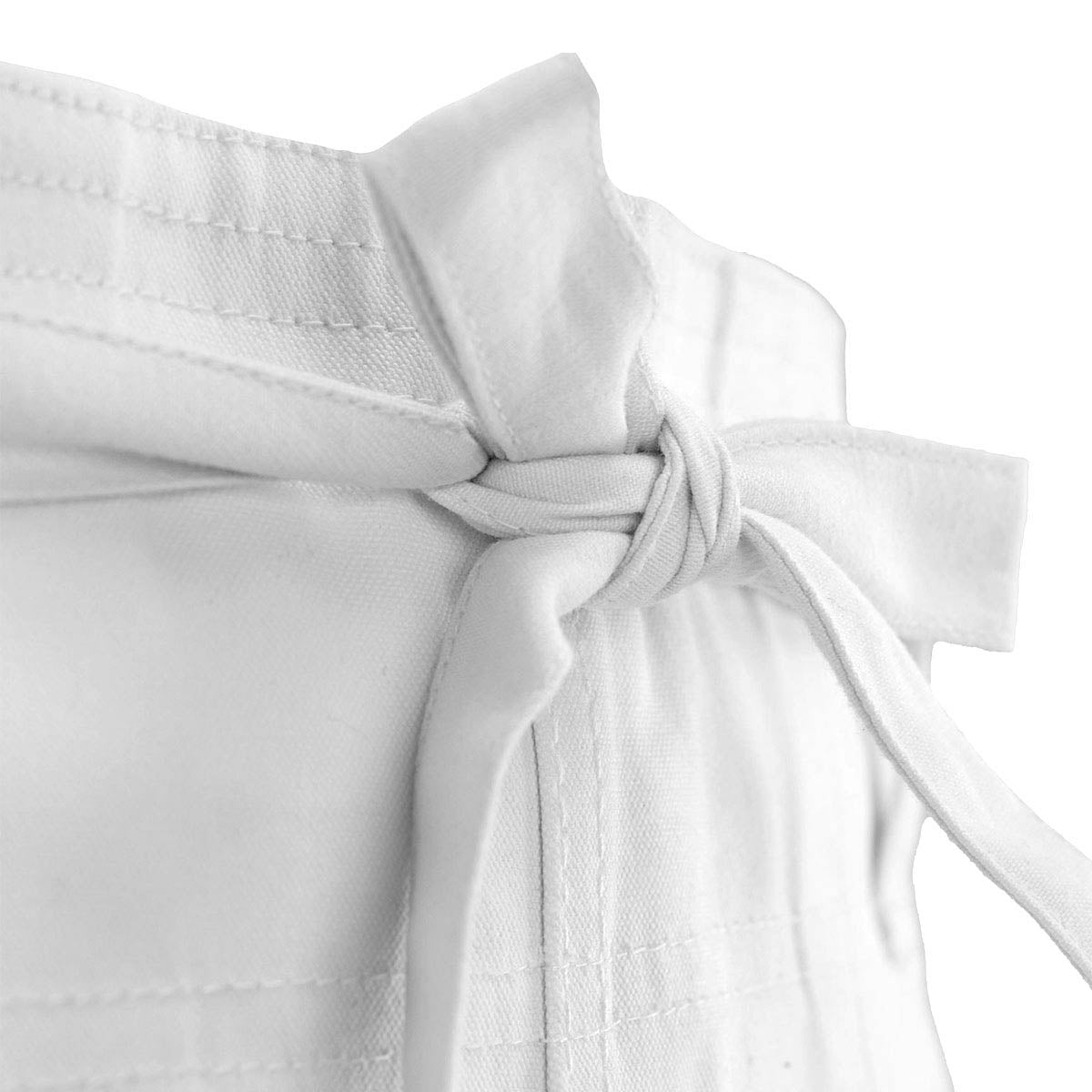 White gi jacket collar with tied wrap belt knot
