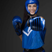 Blue kick light sleeveless tee with white emblem logo, worn on a boxer