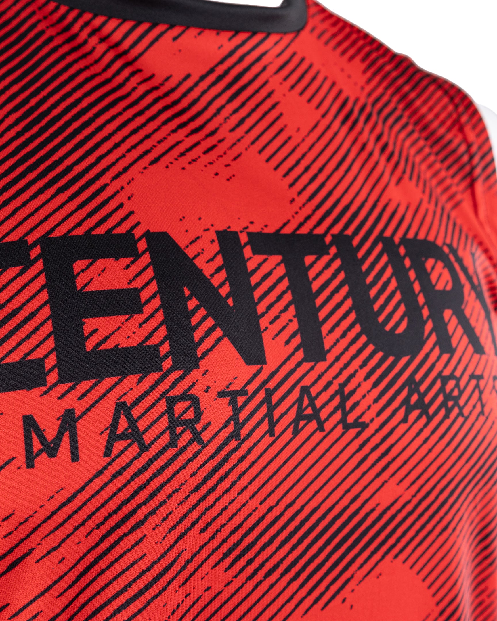 Men's red sleeveless tee with black collar and CENTURY MARVEL text