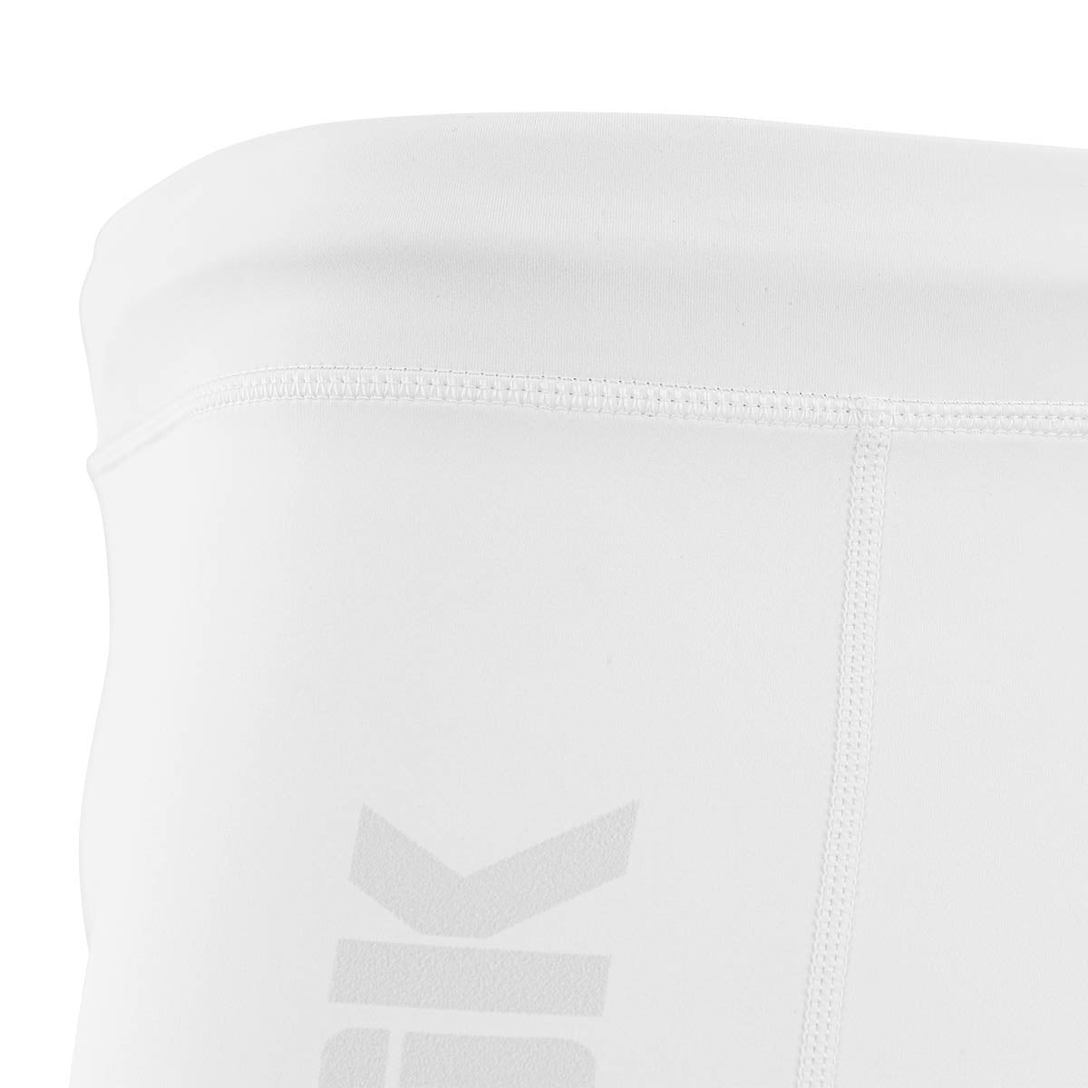 White compression shorts for gi, close-up of waistband and logo