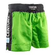 WAKO kickboxing shorts in neon green, side view with black logo strap panel