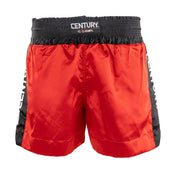 Red kickboxing shorts with black waistband and CENTURY logo patch