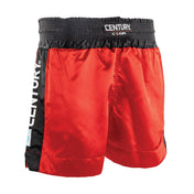 Red kickboxing shorts with black side panels and CENTURY waistband logo