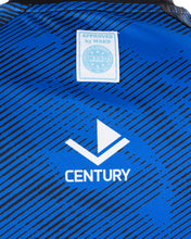 Back neck label and Century Inspire graphic on blue patterned light contact tee