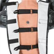 Back of black padded jacket with three black elastic straps and round snap
