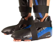Determination kicks boxing ankle guards worn, black and blue panels with hook-and-loop straps