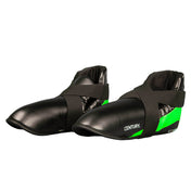 Black boxing kick shoes with green accents and wide hook-and-loop straps
