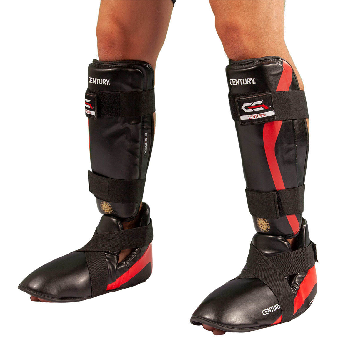 Determination kicks boxing ankle guard set on legs, black and red with padded shin