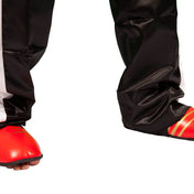 Red kickboxing kick pads with black lower panel; elastic strap around the ankle