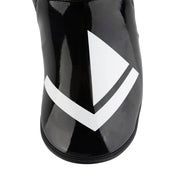 Silver boxing kick boot with white shield-style logo and black ankle strap