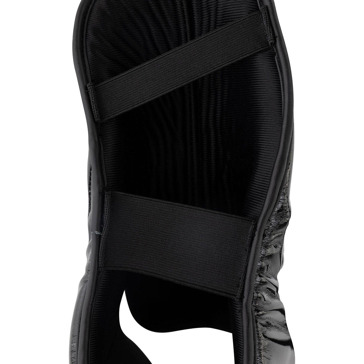 Black boxing kick boot with two hook-and-loop ankle straps and padded interior