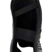 Black boxing kick boot with two hook-and-loop ankle straps and padded interior
