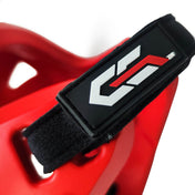 Red helmet with black chin strap and raised Century logo pad