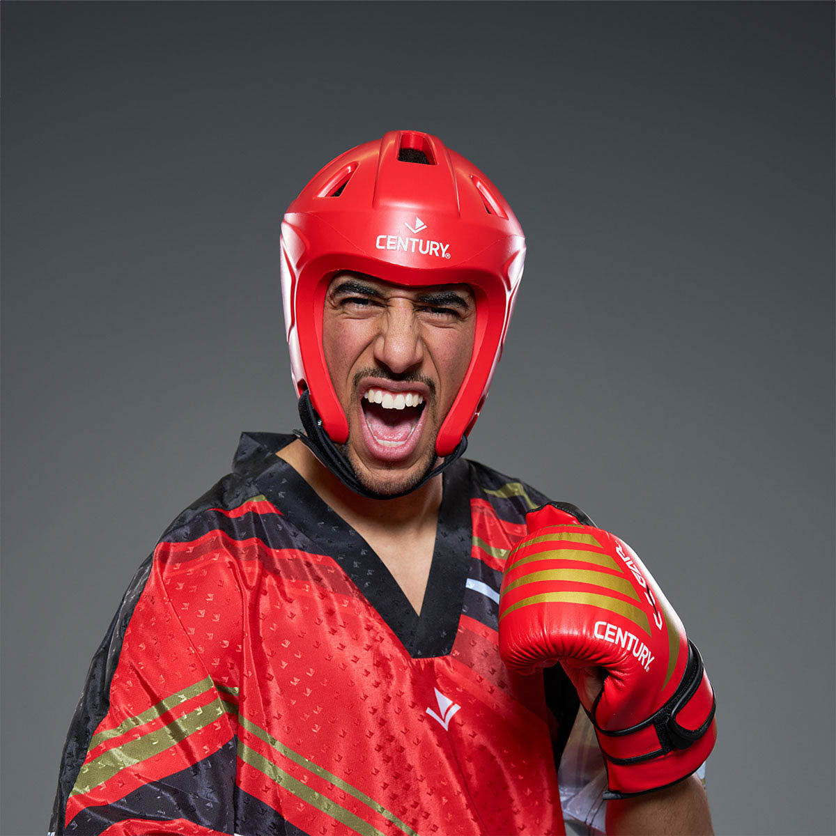 Red C-Gear Evolution headgear helmet with face padding and black chin strap