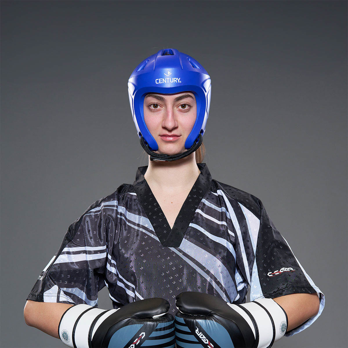Blue C-Gear Evolution headgear helmet with face padding and black chin strap