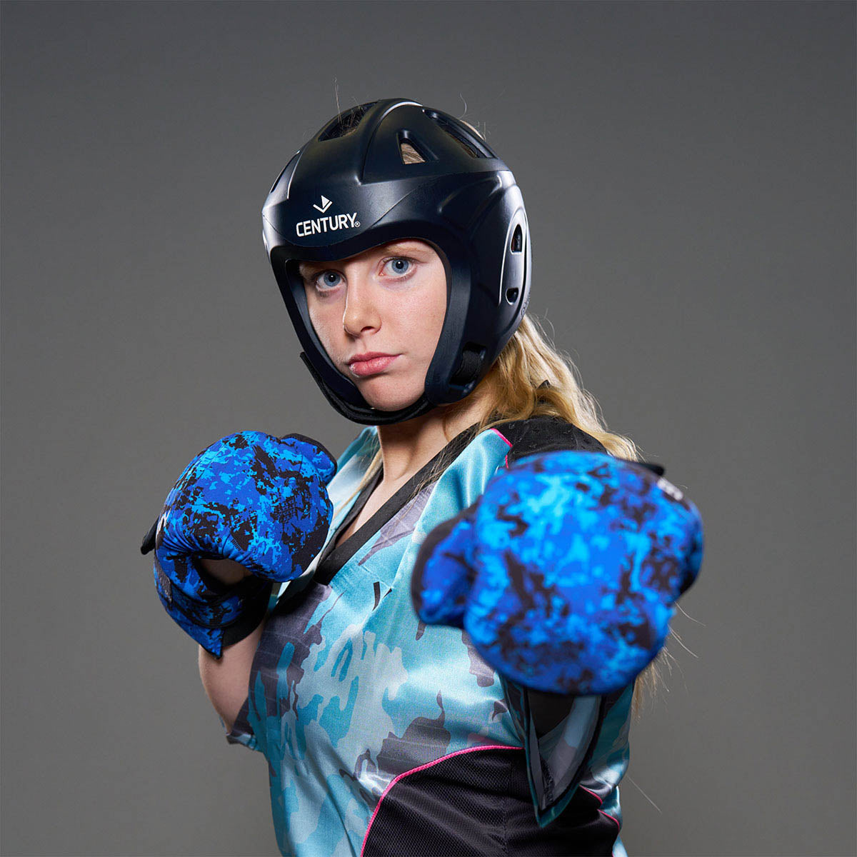 Black C-Gear Evolution headgear helmet with face guard and black chin strap