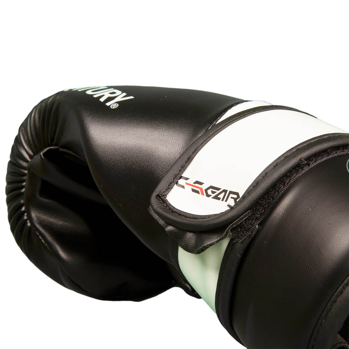 Boxing punch glove close-up, black and mint with padded knuckle and strap