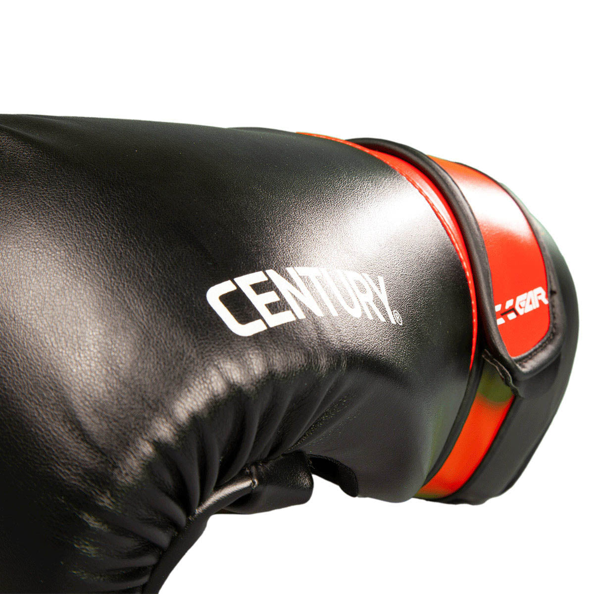 Close-up black boxing glove with Century logo and red edge trim