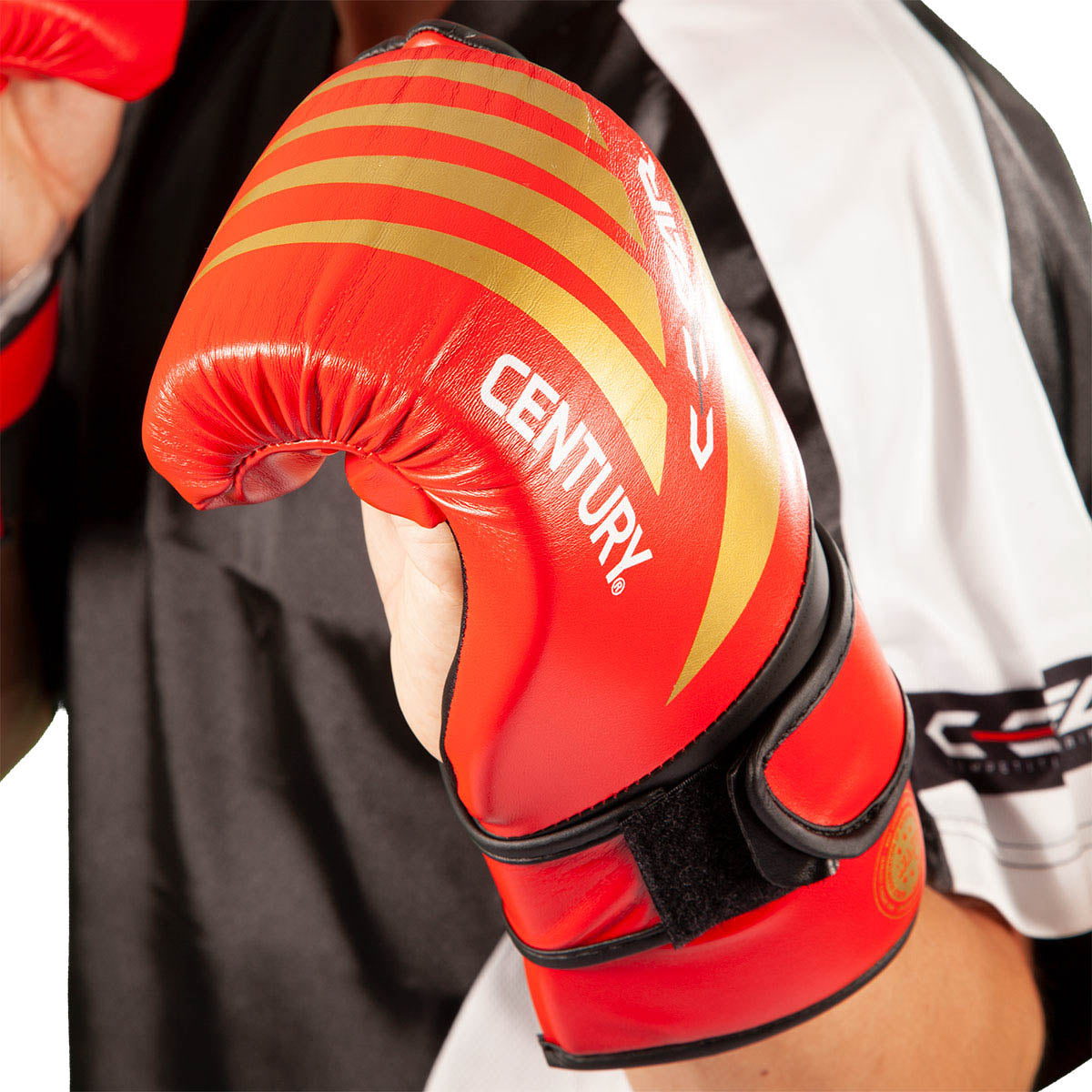 C-Gear boxing glove close-up on hand, red padding with CENTURY text