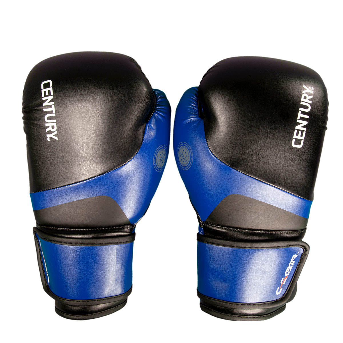 Kickboxing punch gloves, black with blue panels, curved knuckle padding and wrist band