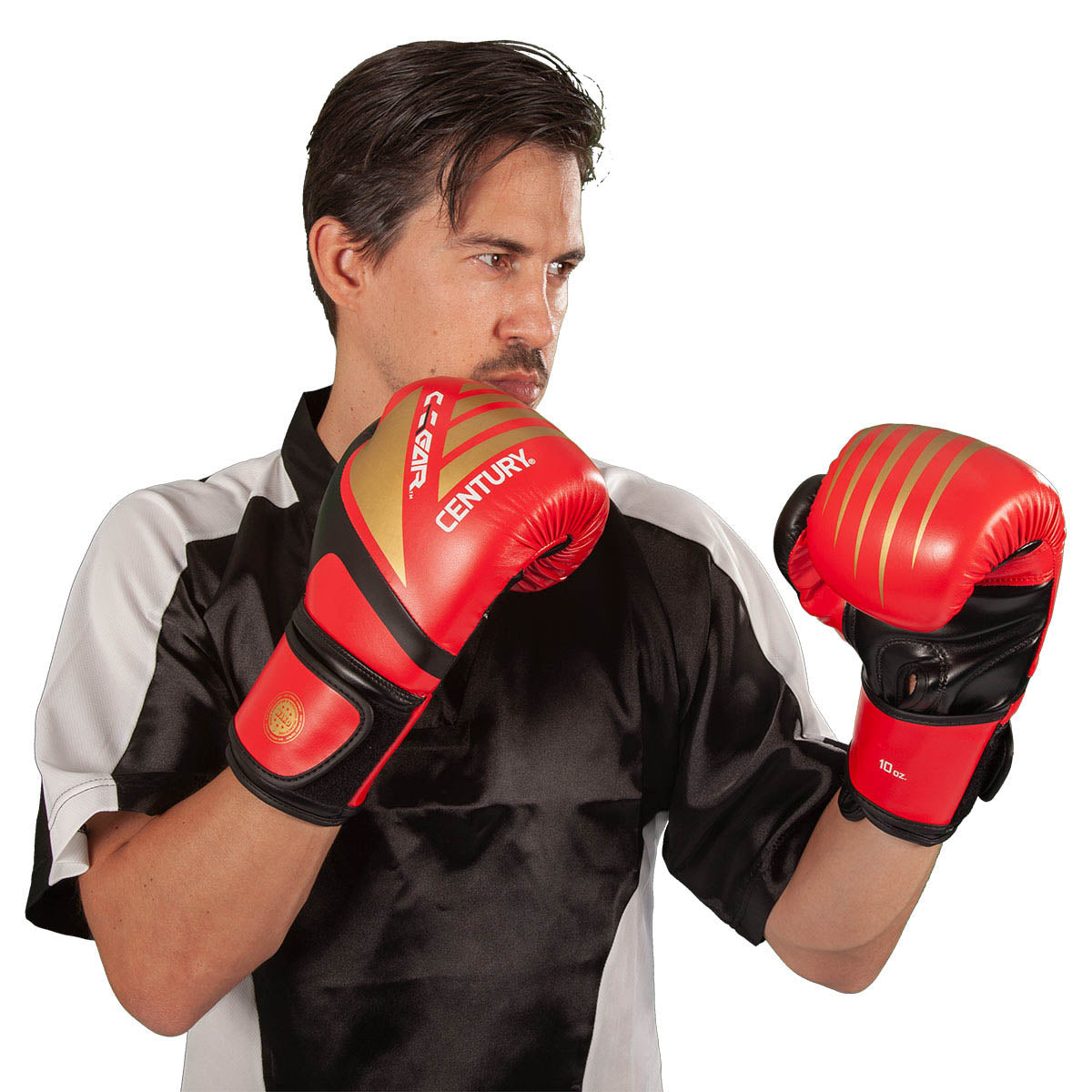 Red and black kickboxing gloves worn on hands, Century logo