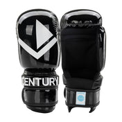 Pair of black boxing gloves with white V logo and WAKO patch on wrist.