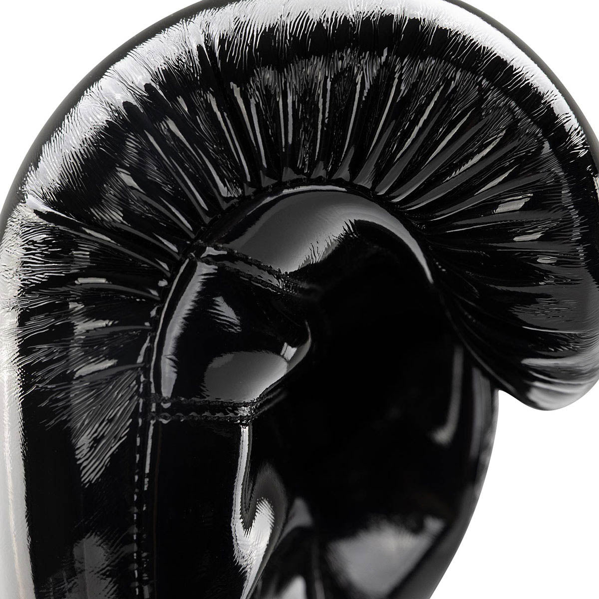 Black Valor kickboxing glove close-up with glossy shell and curved knuckle padding