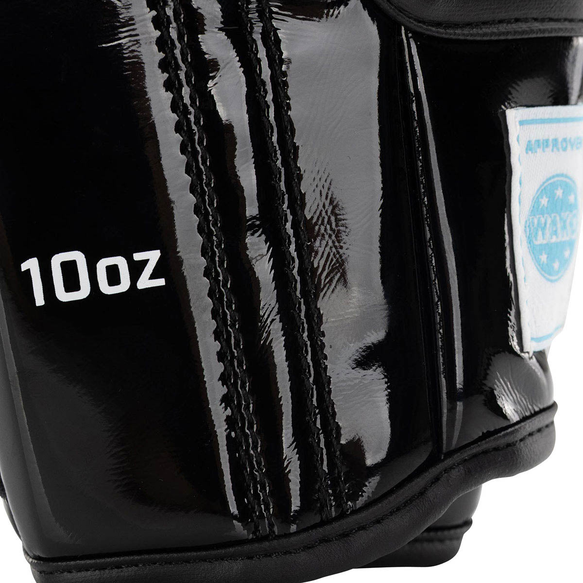 Black Valor kickboxing glove cuff close-up showing 10oz marking and stitched panels