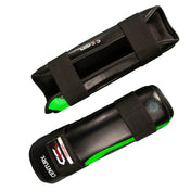 Black shin guards with green stripe and front strap closure; interior lining visible.