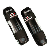 Pair of black boxing shin guards with white stripe panels and black straps