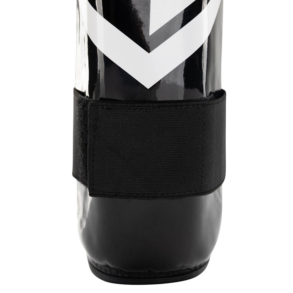 Black shin guards with wide bottom strap and chevron logo on the shell
