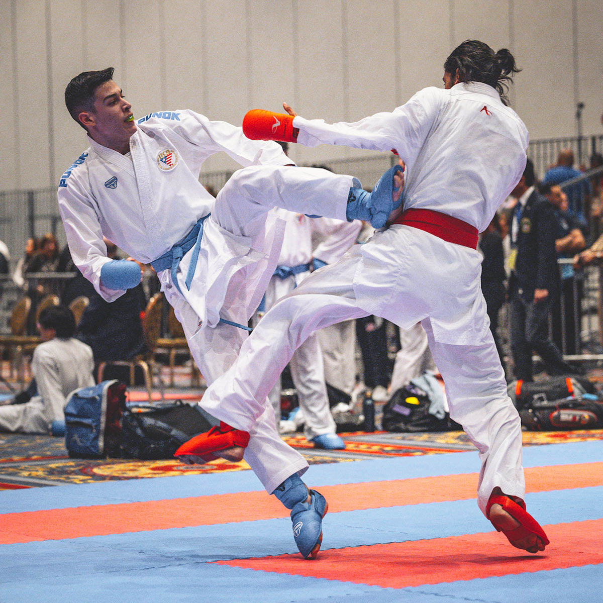 Punok WKF-approved shin and instep guards worn during taekwondo sparring