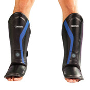 Black shin instep guards with blue diagonal stripes and padded ankle openings