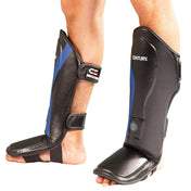 Pair of black shin instep guards with blue diagonal accents and ankle straps