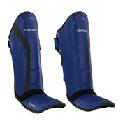 Blue shin instep guards, front view, with black edging and hook-and-loop closure