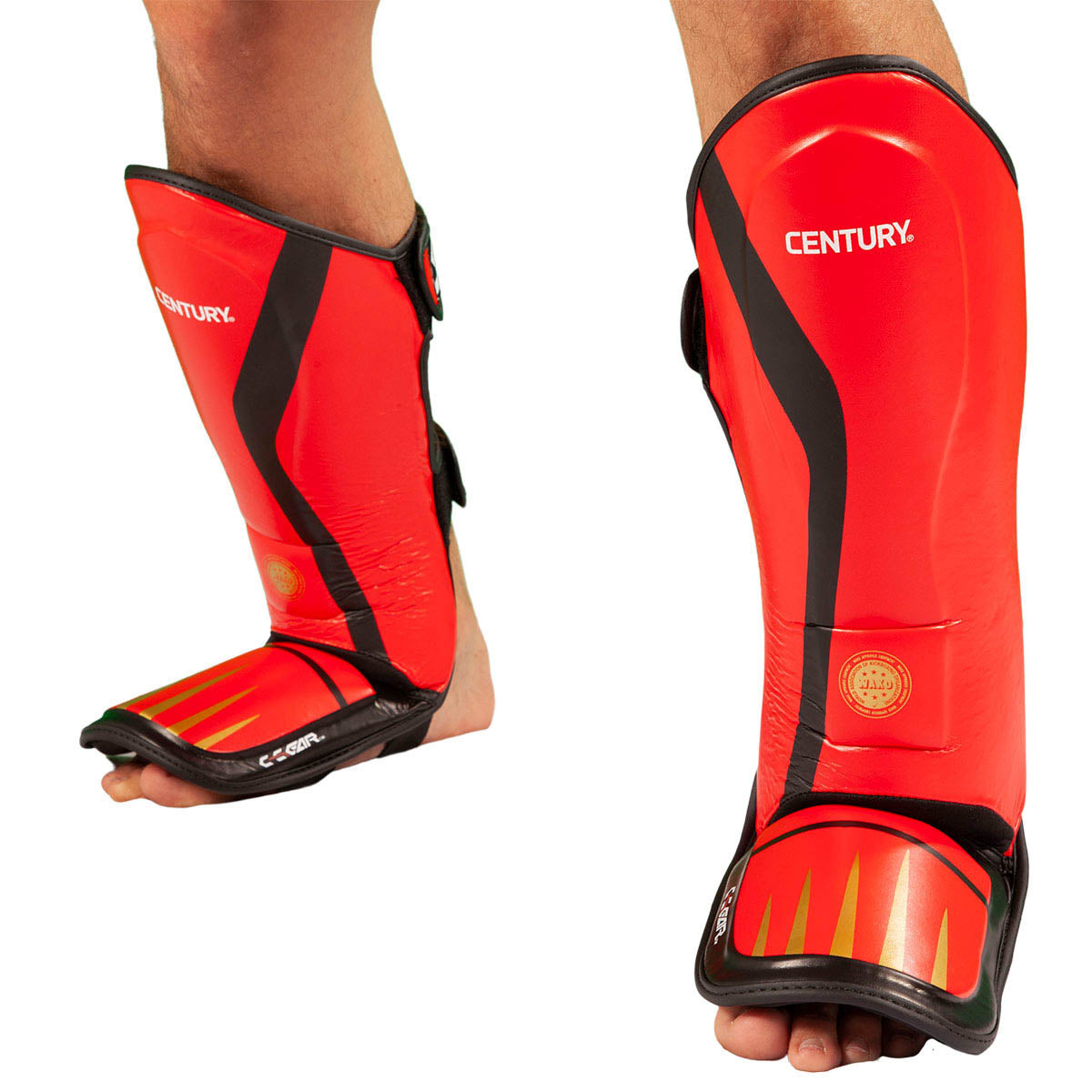Red shin and instep guards worn, black side straps and Century branding