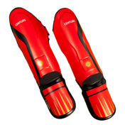 Red shin and instep guards angled front view, black straps and Century logo
