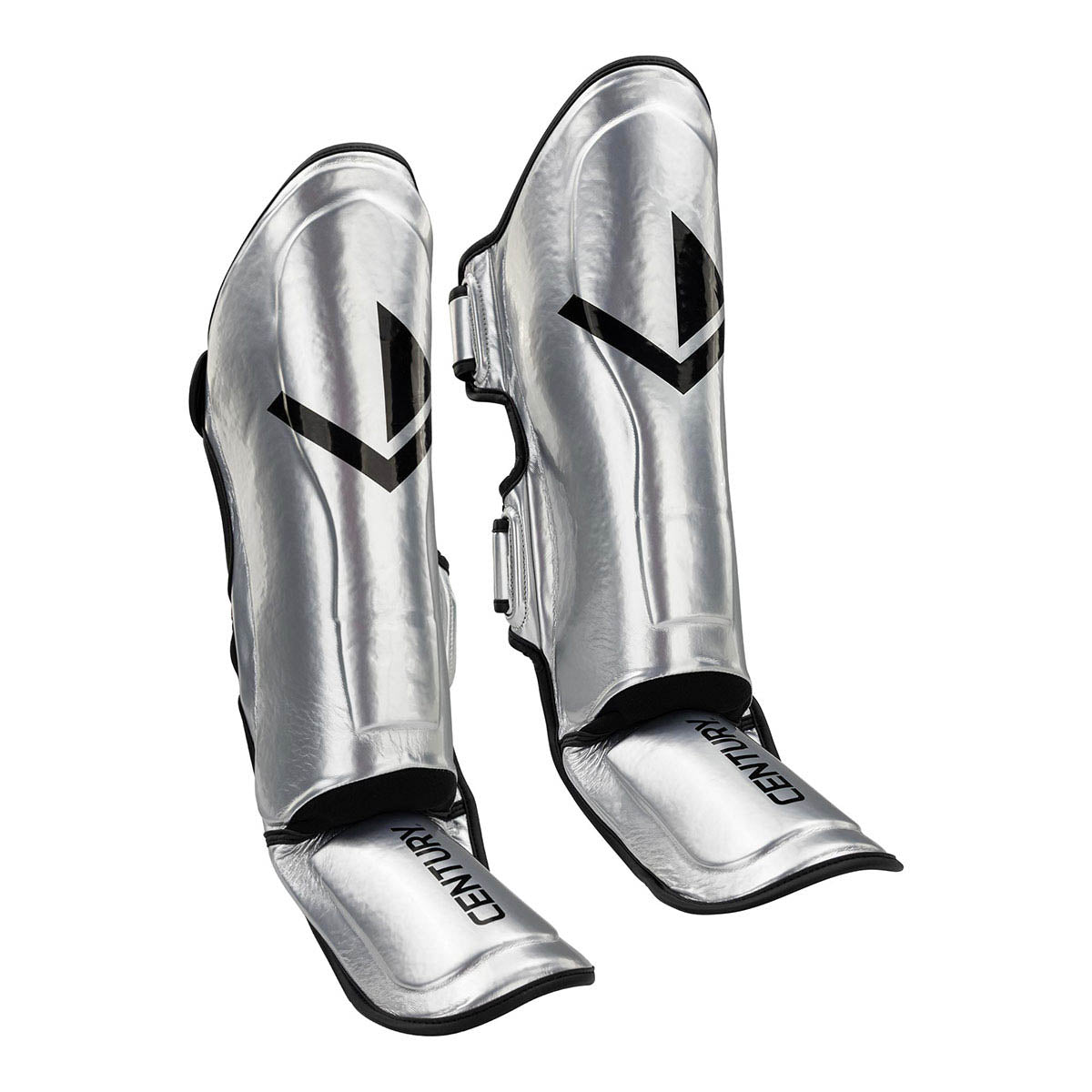Silver shin guards with glossy finish, V logo panels, and adjustable strap