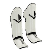 Pair of white shin guards with black trim and V-logo detail, with protective straps