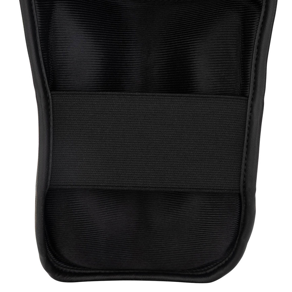 Black shin guard sleeve with textured fabric panel and padded front section.