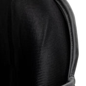 WAKO Valor shin guards, close-up of black textured outer shell surface