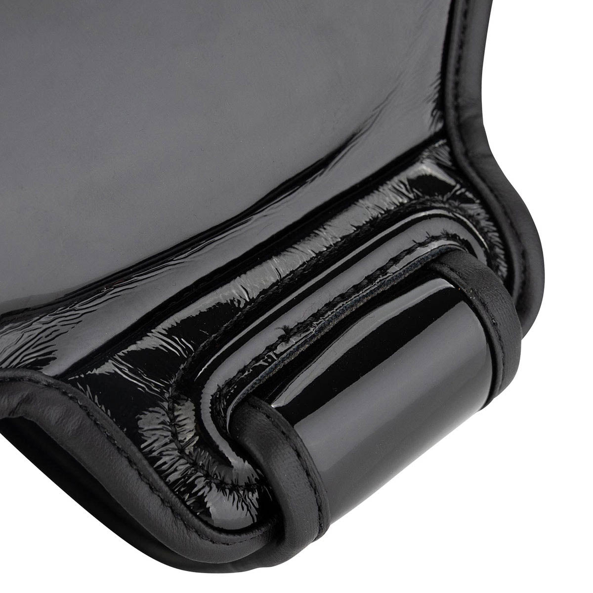 WAKO Valor shin guards, close-up of padded edge and curved protective shell