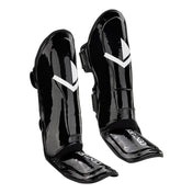 Black shin guards with glossy finish, V logo, and adjustable fastening strap